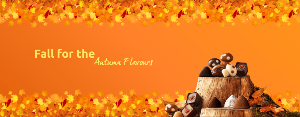 Autumn-themed display with chestnuts and leaves on an orange background