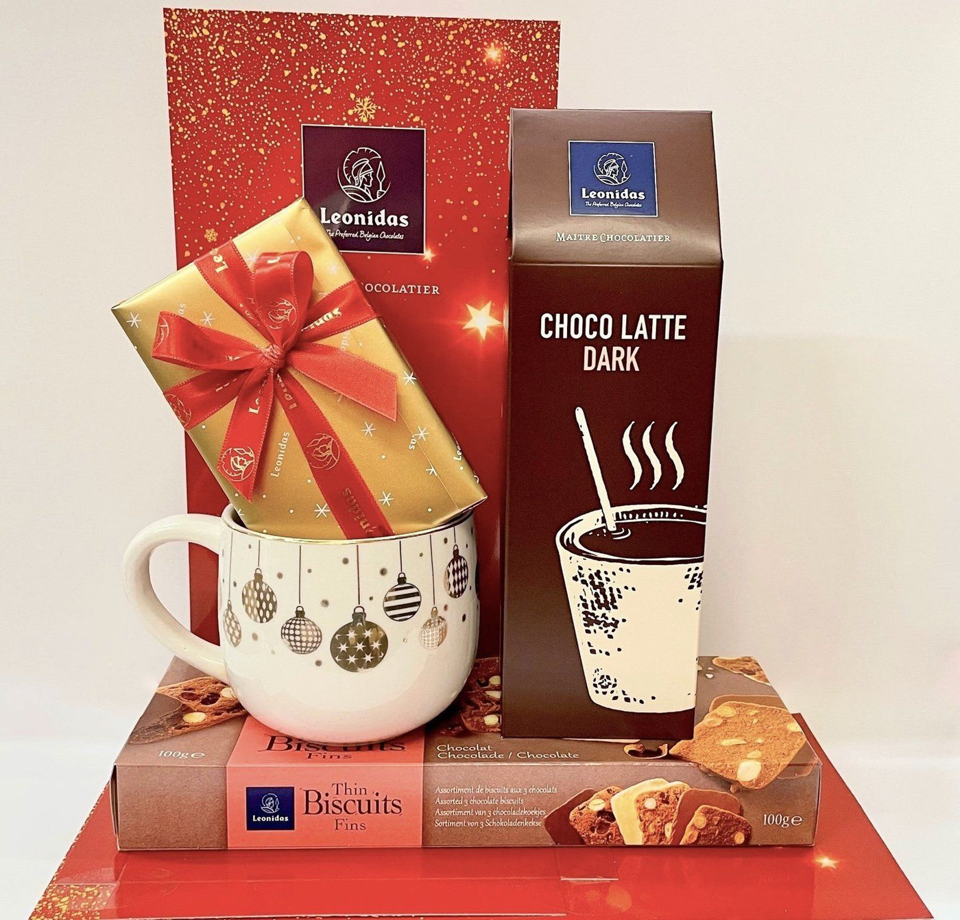 CLICK & COLLECT ONLY - Leonidas Christmas Chocolate Hamper with a Mug, 4 Itens Leonidas Kensington