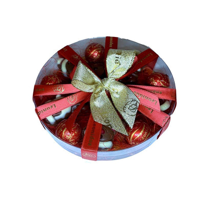 Leonidas Christmas Round Cello Assorted Chocolate Novelty, 250g Approx Leonidas Kensington