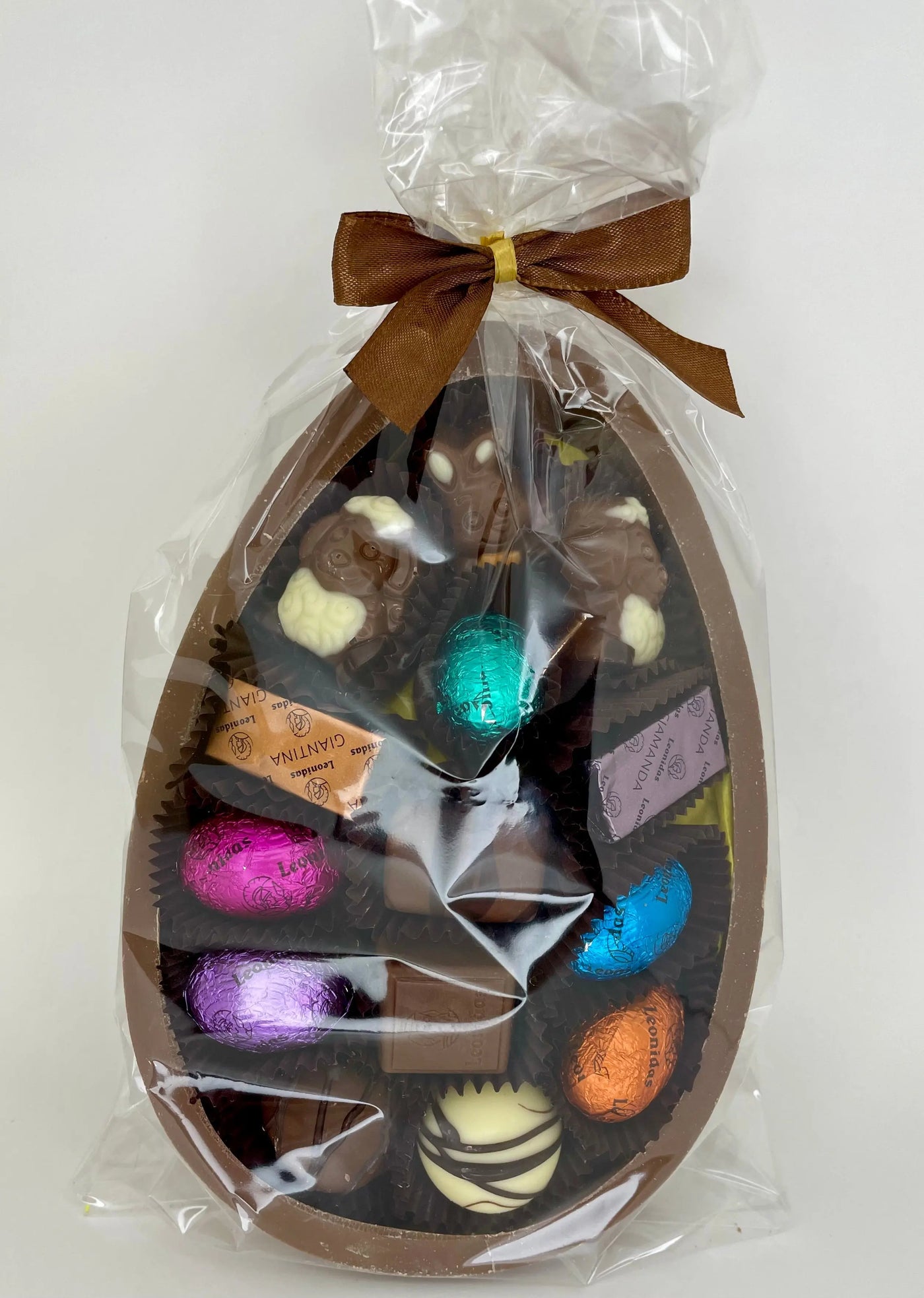 Leonidas Easter Milk Chocolate Half Egg With Novelty, Mini Eggs & Assorted Chocolates, 350g Approx Leonidas Kensington