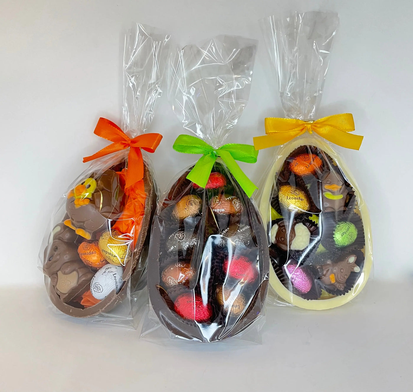 Leonidas Easter Set of 3 Milk, Dark & White Chocolate Half Egg Shell Filled with Novelty And Mini Eggs, 250g Approx Leonidas Kensington